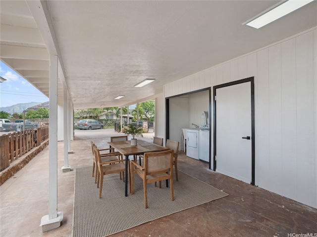 87-153 Kimo St, Waianae, HI 96792 - view of patio / terrace featuring washer and clothes dryer and outdoor dining space