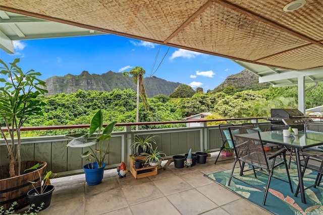 51-17 Kaaawa Pl, Kaaawa, HI 96730 - view of patio / terrace with a mountain view, a grill, a forest view, and outdoor dining space