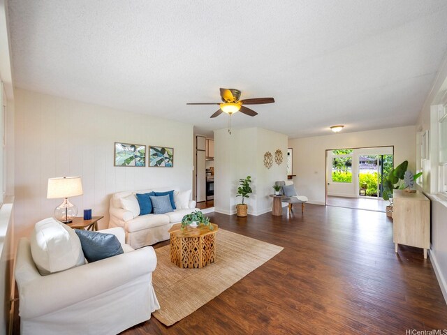 1257 Maleko St, Kailua, HI 96734 - living room featuring dark wood-style flooring, ceiling fan, and baseboards
