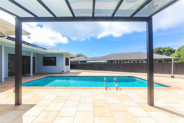view of pool featuring a patio and a fenced backyard