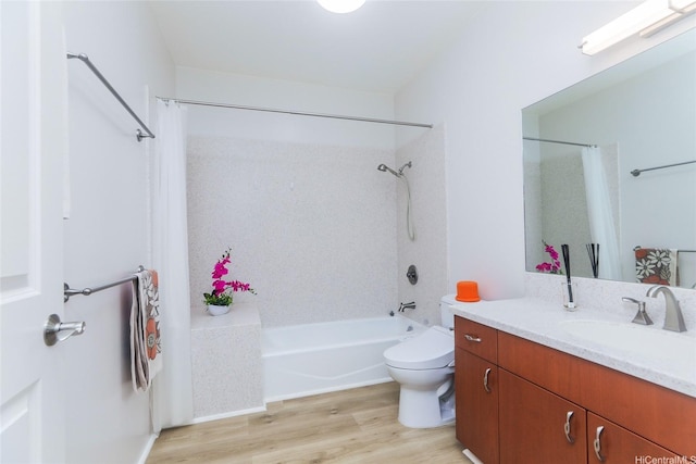 bathroom featuring vanity, shower / tub combo with curtain, wood finished floors, and toilet