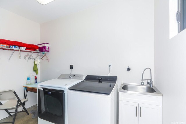 laundry area with cabinet space and washer and clothes dryer