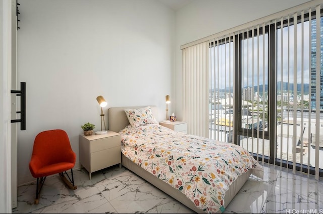 987 Queen St Unit 814, Honolulu, HI 96814 - bedroom with light marble finish floors and a city view