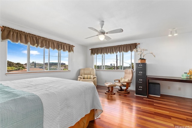 99-060 Nalopaka Pl, Aiea, HI 96701 - bedroom featuring wood finished floors and ceiling fan