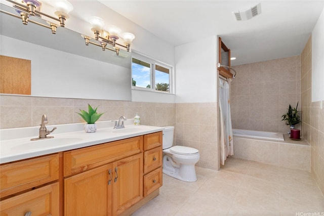 99-060 Nalopaka Pl, Aiea, HI 96701 - bathroom with tile walls, tile patterned floors, double vanity, and tiled shower / bath combo