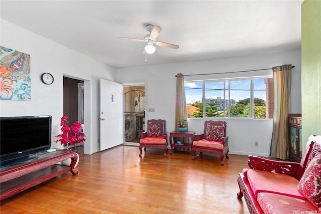 99-060 Nalopaka Pl, Aiea, HI 96701 - living area with ceiling fan and wood finished floors