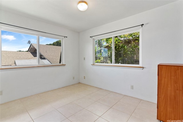 99-060 Nalopaka Pl, Aiea, HI 96701 - tiled empty room with healthy amount of natural light