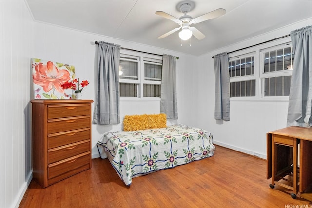 99-060 Nalopaka Pl, Aiea, HI 96701 - bedroom featuring wood finished floors and a ceiling fan