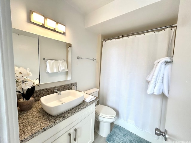 1624 Kanunu St Unit 1208, Honolulu, HI 96814 - full bathroom with vanity, toilet, curtained shower, and tile patterned floors