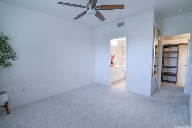 7018 Hawaii Kai Dr Unit 6-12, Honolulu, HI 96825 - unfurnished bedroom featuring light carpet, ensuite bath, and ceiling fan