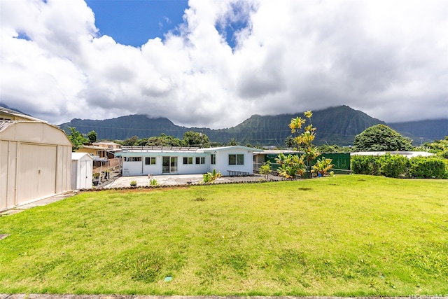 45-155 Pahikoli Pl, Kaneohe, HI 96744 - view of front of house featuring a patio and a mountain view