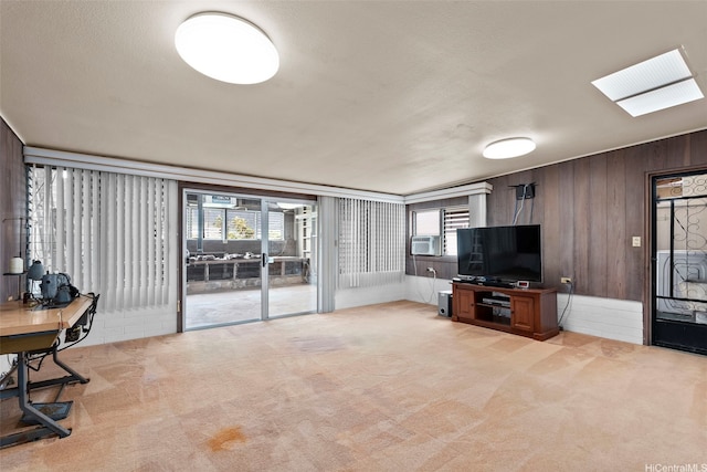 45-155 Pahikoli Pl, Kaneohe, HI 96744 - living room with light carpet, wood walls, cooling unit, and an office area