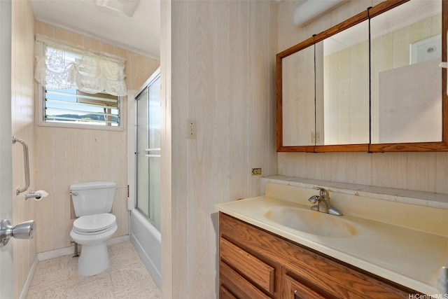 45-155 Pahikoli Pl, Kaneohe, HI 96744 - bathroom with toilet, vanity, bath / shower combo with glass door, and baseboards