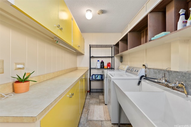 98-042 Puaalii Way, Aiea, HI 96701 - laundry area with independent washer and dryer, cabinet space, light stone finish floors, and a textured ceiling