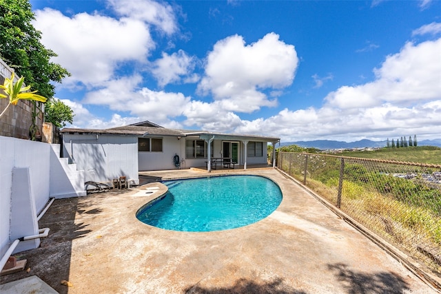 98-042 Puaalii Way, Aiea, HI 96701 - view of pool featuring a patio area, a fenced backyard, and a mountain view