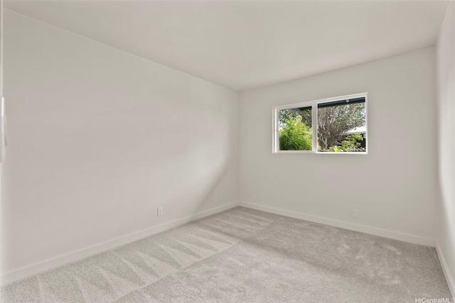 1210 Hooli Cir, Pearl City, HI 96782 - spare room featuring baseboards and light colored carpet