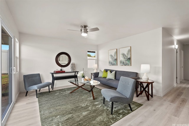 1210 Hooli Cir, Pearl City, HI 96782 - living room featuring light wood finished floors, baseboards, and ceiling fan