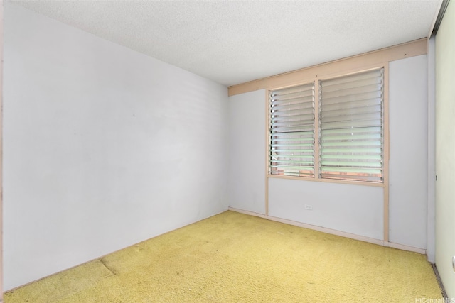 95-456 Kaelo Pl, Mililani, HI 96789 - carpeted spare room featuring a textured ceiling