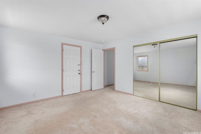 95-456 Kaelo Pl, Mililani, HI 96789 - unfurnished bedroom featuring carpet flooring, a closet, and baseboards