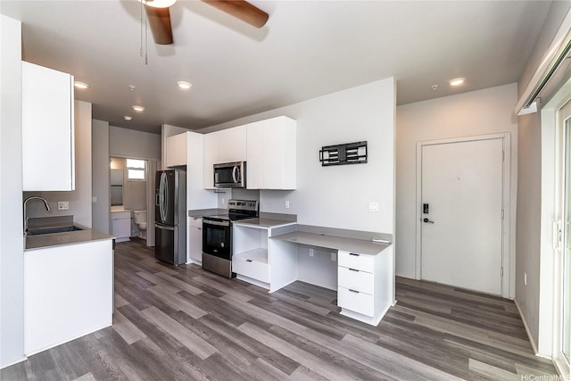 91-3617 Kamolehonua St Unit 613, Ewa Beach, HI 96706 - kitchen featuring stainless steel appliances, a ceiling fan, white cabinetry, dark wood-style floors, and recessed lighting