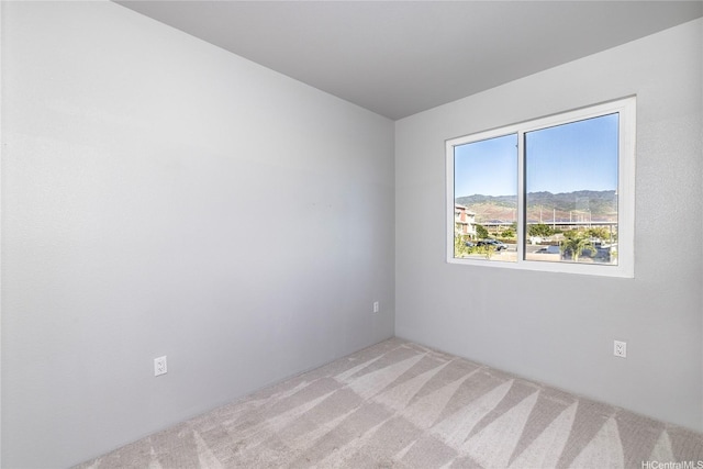 91-3617 Kamolehonua St Unit 613, Ewa Beach, HI 96706 - spare room featuring carpet floors and a mountain view