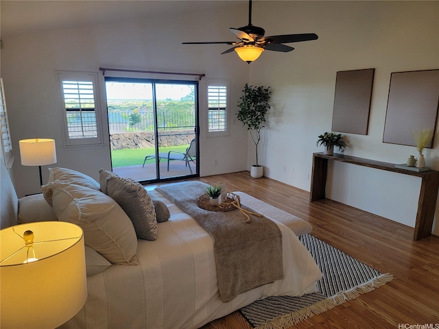 91-1565 Wahane St, Kapolei, HI 96707 - bedroom featuring access to exterior, wood finished floors, multiple windows, and a ceiling fan