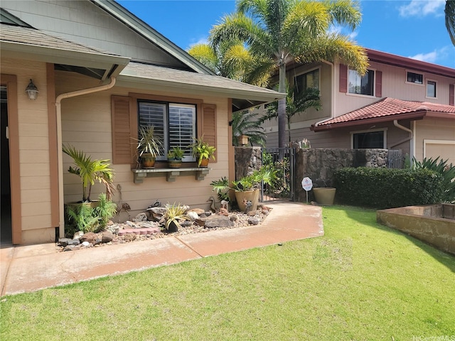 91-1565 Wahane St, Kapolei, HI 96707 - view of front of home with a front yard
