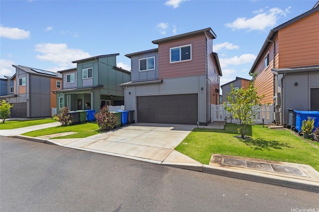 91-1640 Honouliuli St Unit 109, Ewa Beach, HI 96706 - modern home with a garage, driveway, and a residential view