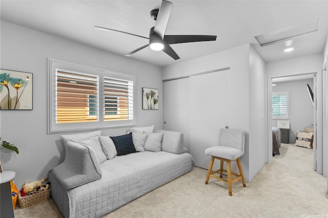91-1640 Honouliuli St Unit 109, Ewa Beach, HI 96706 - carpeted living area featuring attic access and a ceiling fan
