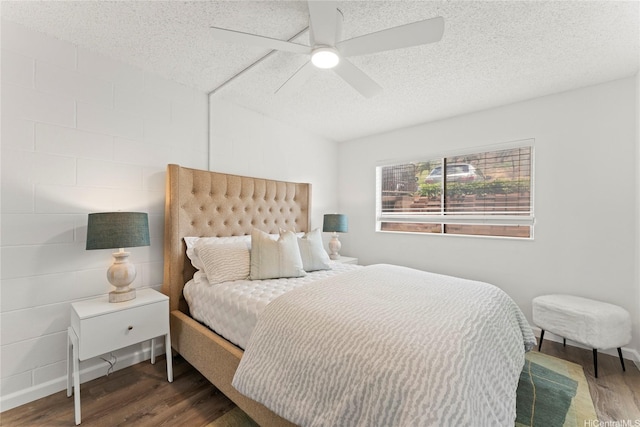 92-1132 Panana St Unit 130, Kapolei, HI 96707 - bedroom featuring wood finished floors, a textured ceiling, a ceiling fan, and baseboards