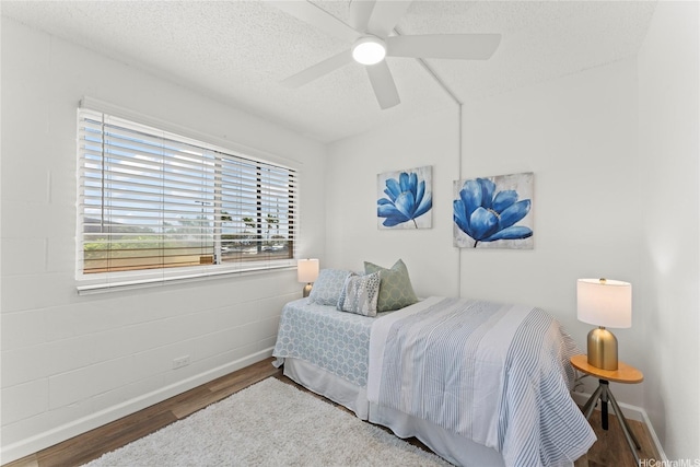 92-1132 Panana St Unit 130, Kapolei, HI 96707 - bedroom with wood finished floors, baseboards, a textured ceiling, and a ceiling fan