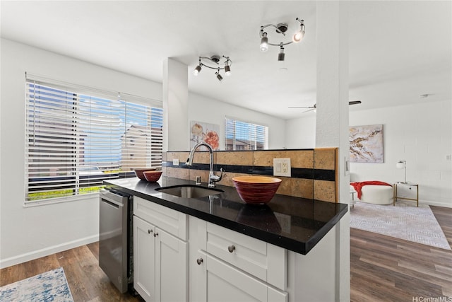 92-1132 Panana St Unit 130, Kapolei, HI 96707 - kitchen featuring a sink, dark countertops, dishwasher, and plenty of natural light