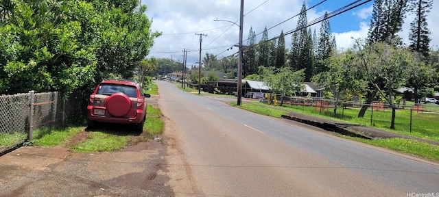 2018 California Ave, Wahiawa, HI 96786 - view of asphalt road with street lighting