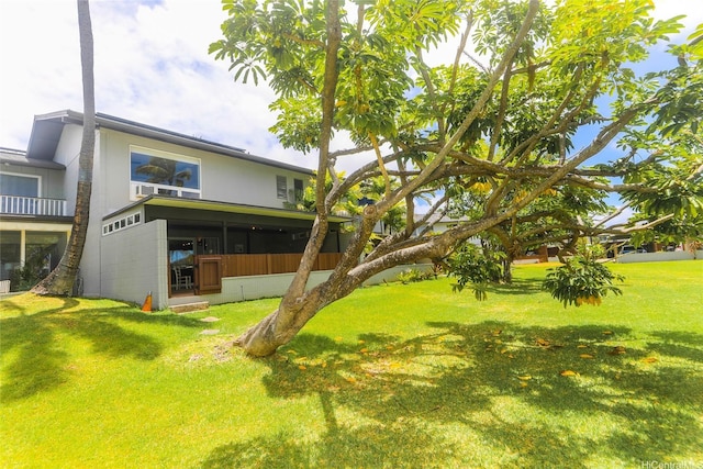 205 Koko Isle Cir Unit 403, Honolulu, HI 96825 - view of green lawn featuring a sunroom