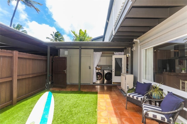 205 Koko Isle Cir Unit 403, Honolulu, HI 96825 - view of yard featuring washing machine and dryer and a patio