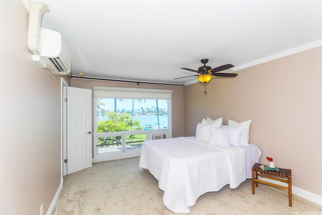 205 Koko Isle Cir Unit 403, Honolulu, HI 96825 - bedroom featuring light carpet, baseboards, a wall mounted air conditioner, and a water view