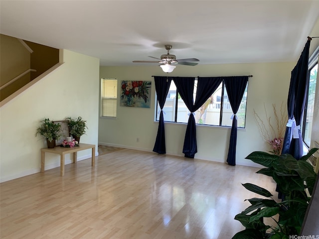 91-1020 Lahi St, Kapolei, HI 96707 - unfurnished room with healthy amount of natural light, light wood-style flooring, and a ceiling fan