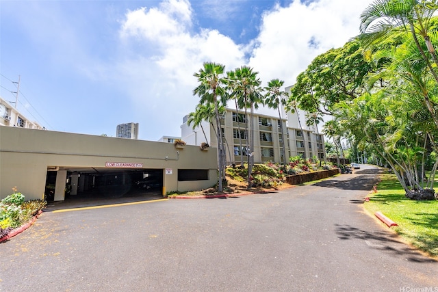 98-1042 Moanalua Rd Unit 2-303, Aiea, HI 96701 - view of building exterior featuring asphalt driveway