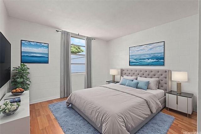 98-1042 Moanalua Rd Unit 2-303, Aiea, HI 96701 - bedroom with light wood-type flooring and concrete block wall