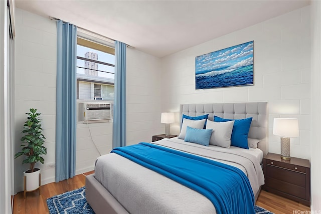98-1042 Moanalua Rd Unit 2-303, Aiea, HI 96701 - bedroom with cooling unit and wood finished floors