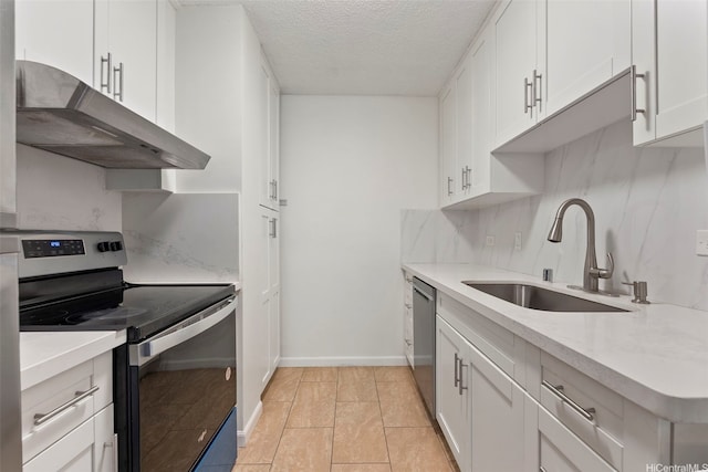 98-1042 Moanalua Rd Unit 2-303, Aiea, HI 96701 - kitchen with stainless steel appliances, under cabinet range hood, a textured ceiling, white cabinets, and backsplash