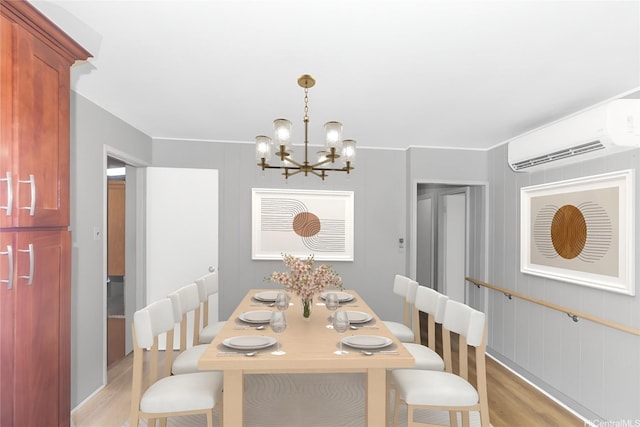 94-1190 Kahuanui St, Waipahu, HI 96797 - dining room with light wood-type flooring, a chandelier, and a wall unit AC