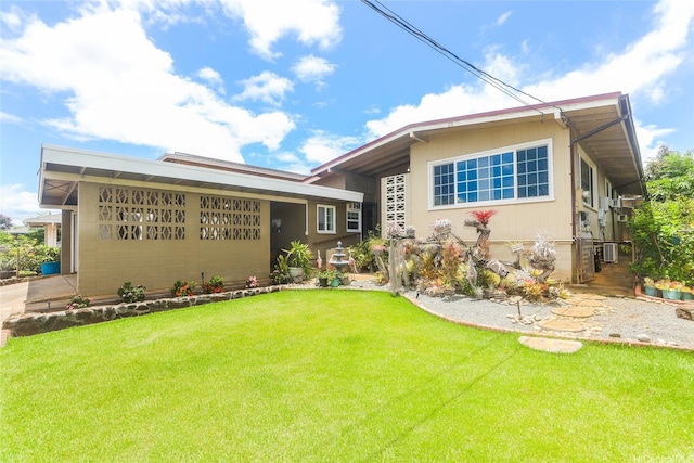 94-1190 Kahuanui St, Waipahu, HI 96797 - view of front facade with a front yard and cooling unit