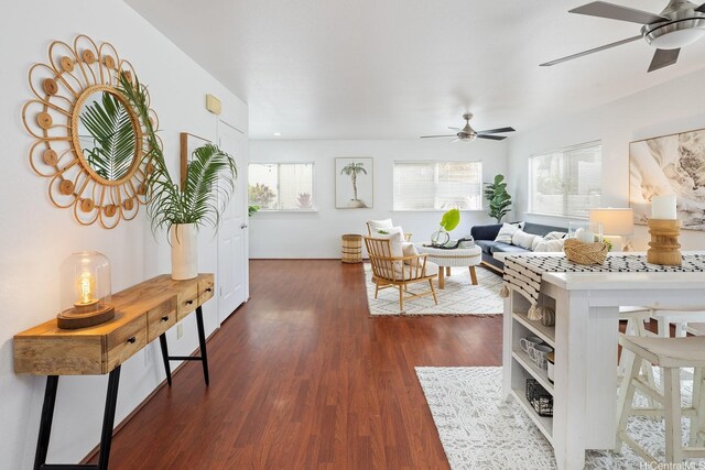 92-7049 Elele St Unit 22, Kapolei, HI 96707 - living area with ceiling fan, plenty of natural light, and dark wood finished floors