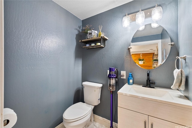 92-1041 Makakilo Dr Unit 82, Kapolei, HI 96707 - half bathroom with toilet, vanity, and a textured ceiling
