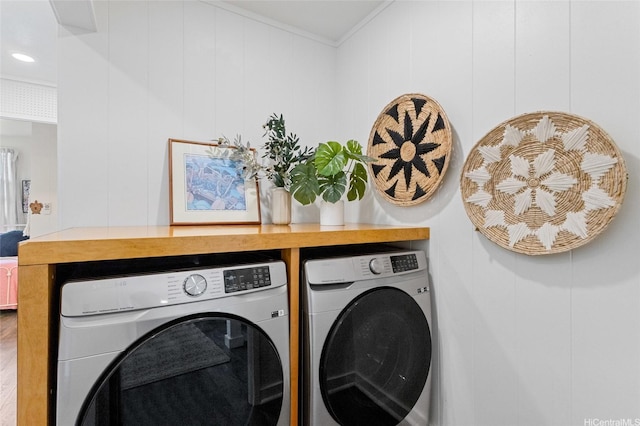 45-173 Kokokahi Pl, Kaneohe, HI 96744 - laundry area with washing machine and clothes dryer and crown molding