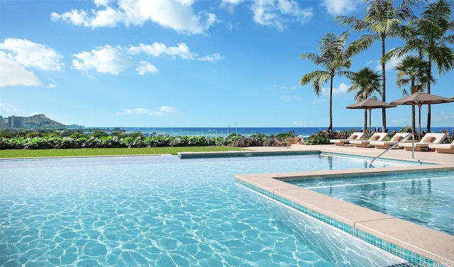 928 Ala Moana Blvd Unit 2711, Honolulu, HI 96814 - community pool featuring a patio