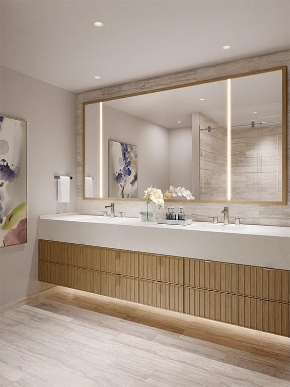 928 Ala Moana Blvd Unit 2711, Honolulu, HI 96814 - bathroom featuring double vanity, a tile shower, and recessed lighting