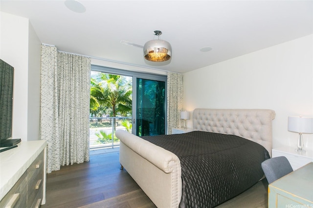 1118 Ala Moana Blvd Unit 2, Honolulu, HI 96814 - bedroom with wood finished floors and access to exterior