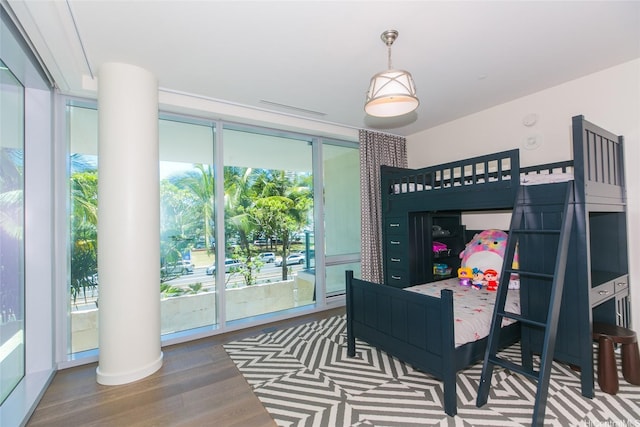1118 Ala Moana Blvd Unit 2, Honolulu, HI 96814 - bedroom featuring a wall of windows, wood finished floors, and access to outside